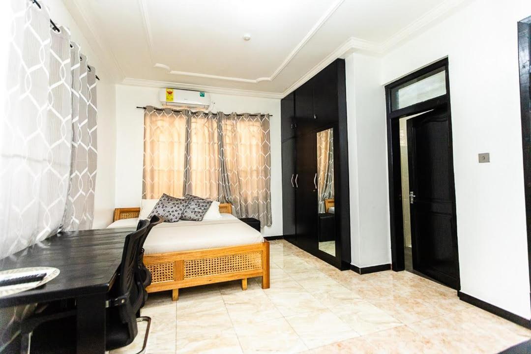 Dann Residence Ogbodjo Bagian luar foto